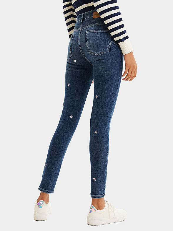 Blue jeans with floral motifs - 2