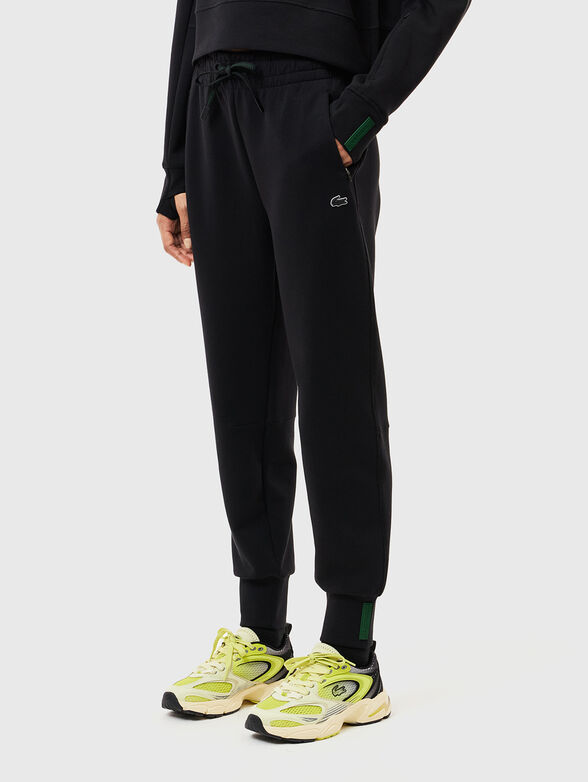 Beige sweatpants with logo details - 1