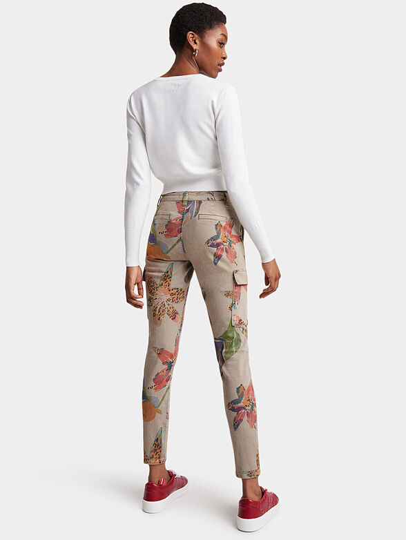 Trousers in beige color with floral motifs - 2