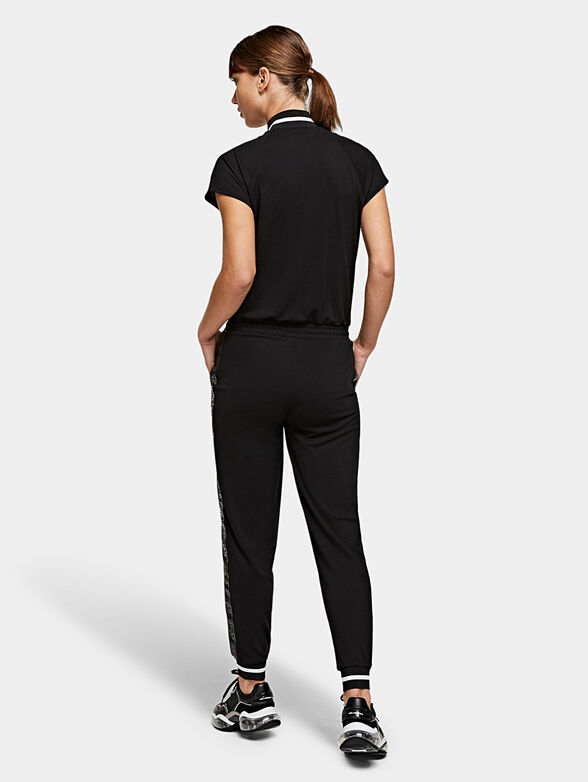 Black jumpsuit with branded tapes - 2