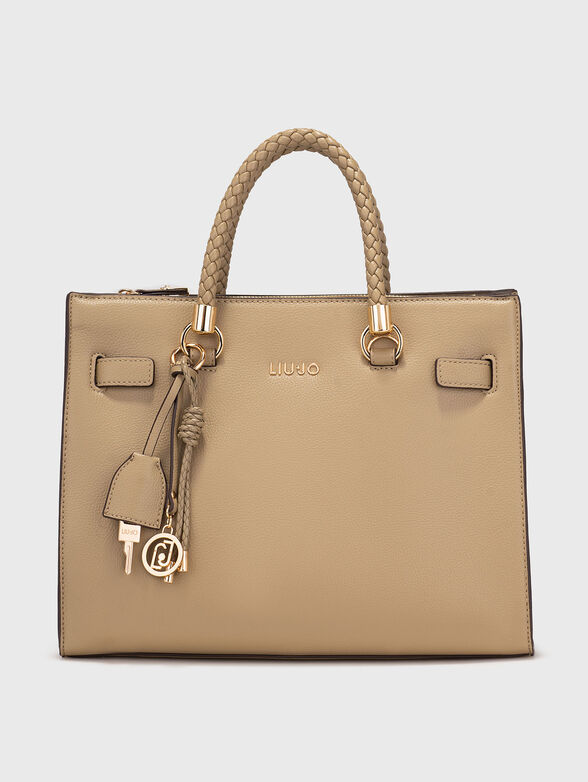 Leather bag with golden logo accent - 1