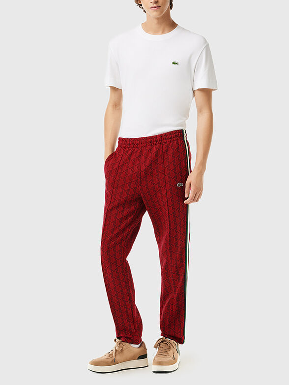 Brown sports trouser with monogram print - 1