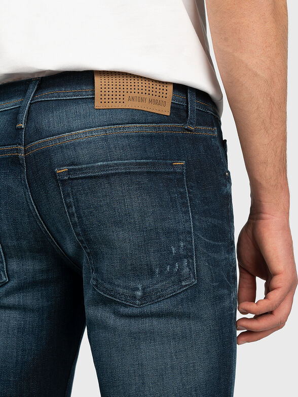 Skinny jeans with abrasions - 4