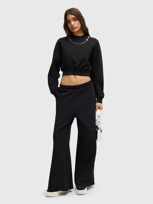 Sports trousers with wide legs - 4