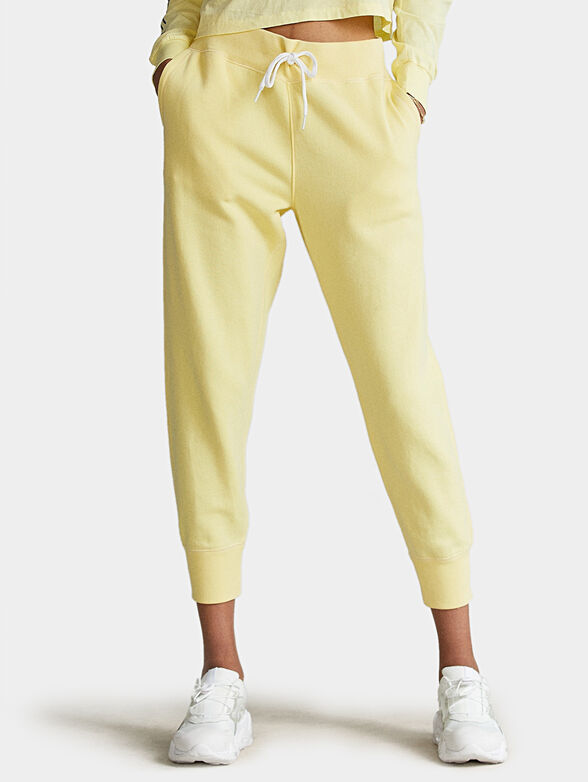 Yellow sports pants with logo - 1