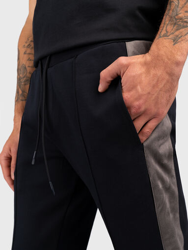 Sports trousers with contrast edging - 4