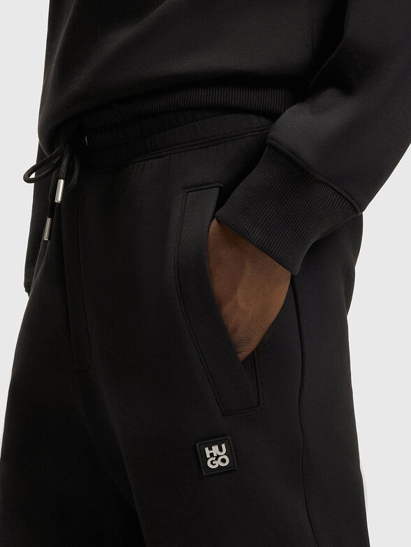 Black sports trousers with ties - 3