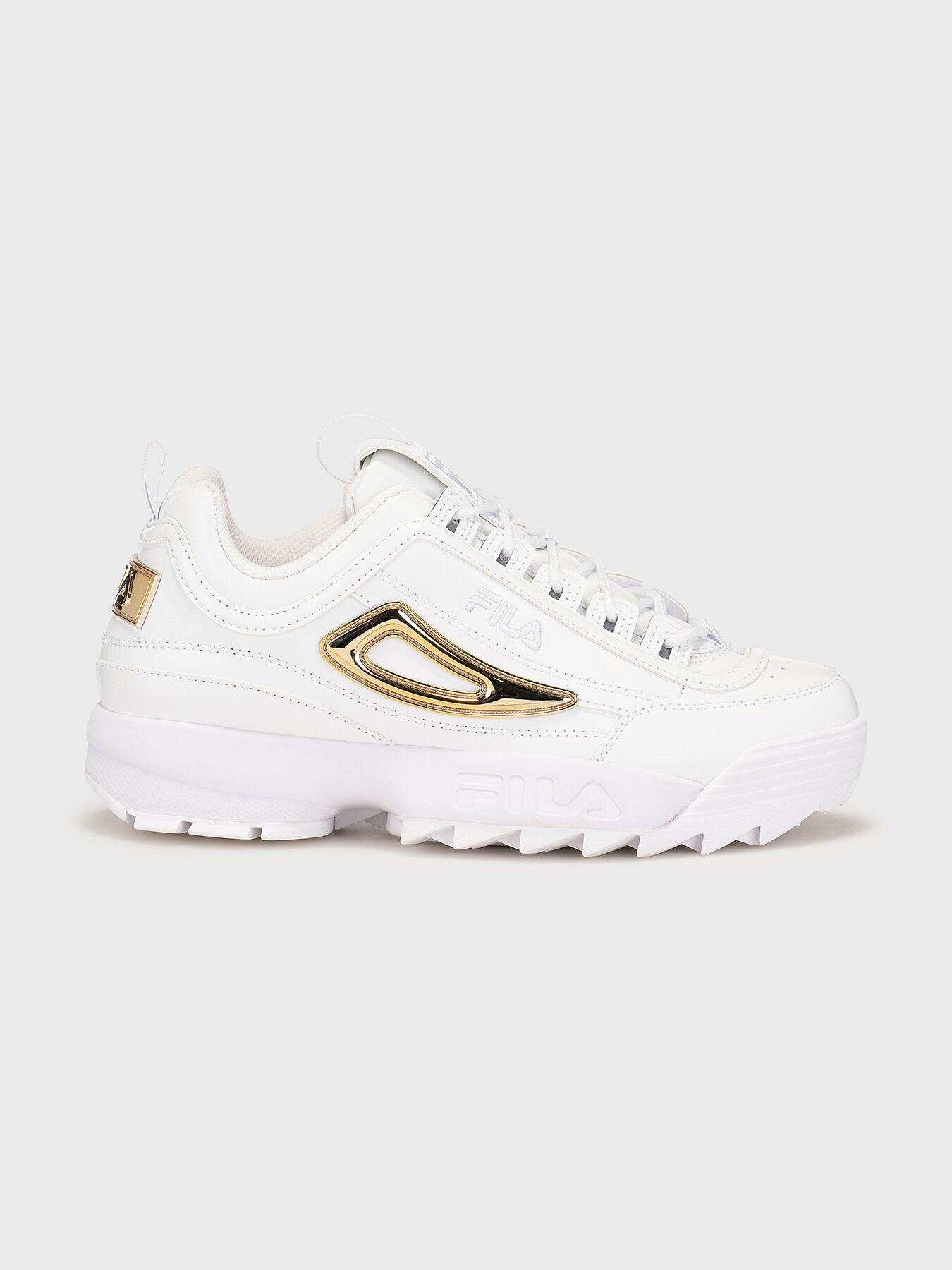 Fila blanche disruptor discount