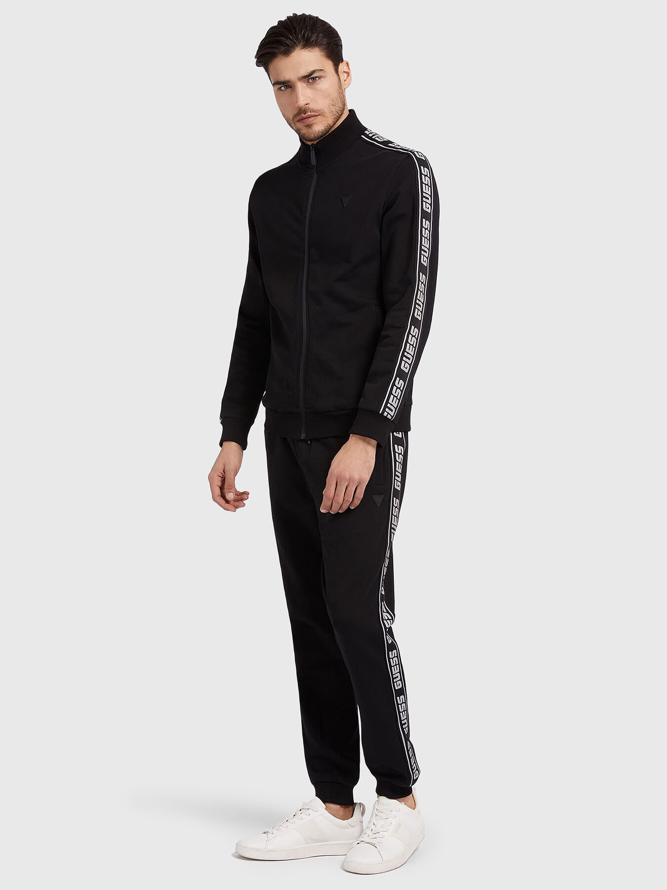 Black sports pants with logo edging brand GUESS