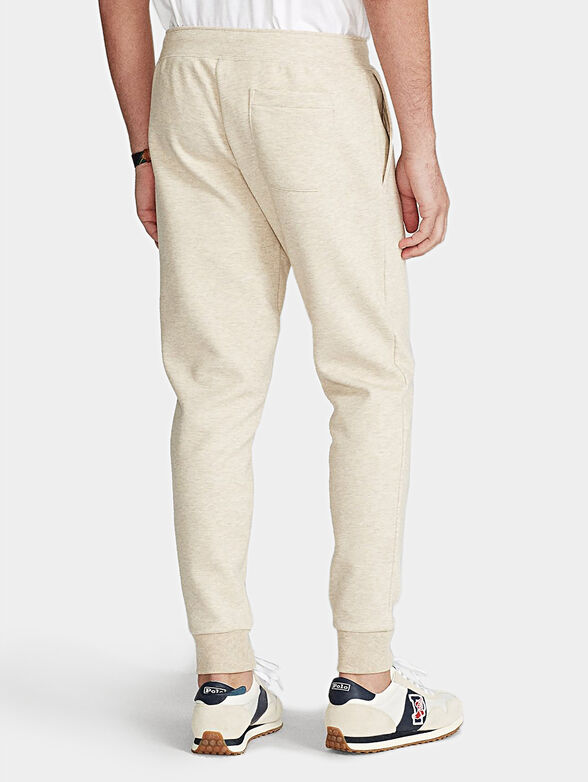 Sports pants in ecru color - 4