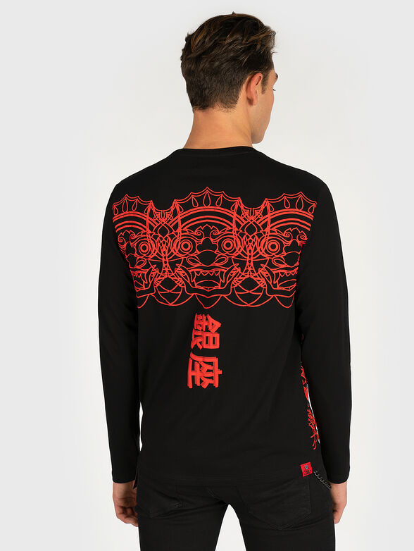 Black blouse with contrasting print - 5