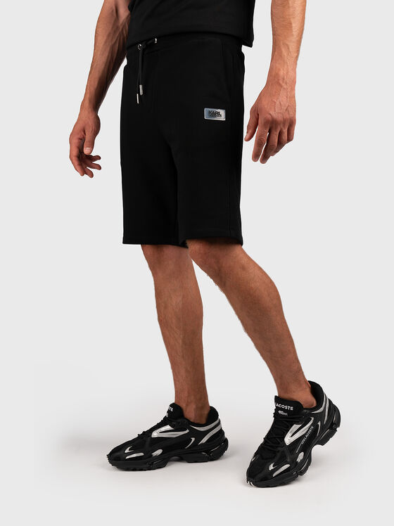 Sports shorts with logo patch - 1