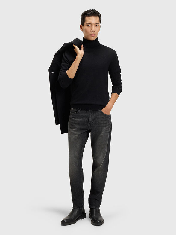 Jeans with washed effect and logo - 4