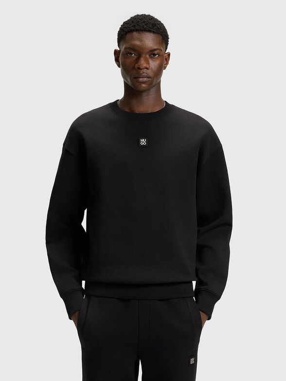 Sweatshirt with oval neckline in black - 1