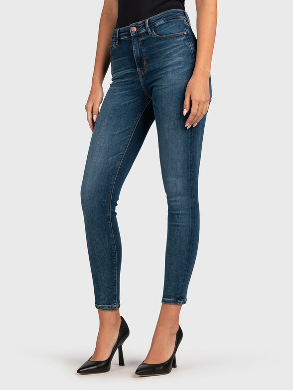 Jeans in blue color with logo patch - 1