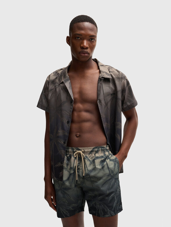 Beach shorts in blue color with print  - 1