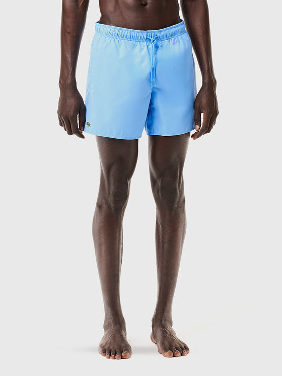 Yellow shorts with logo detail - 1