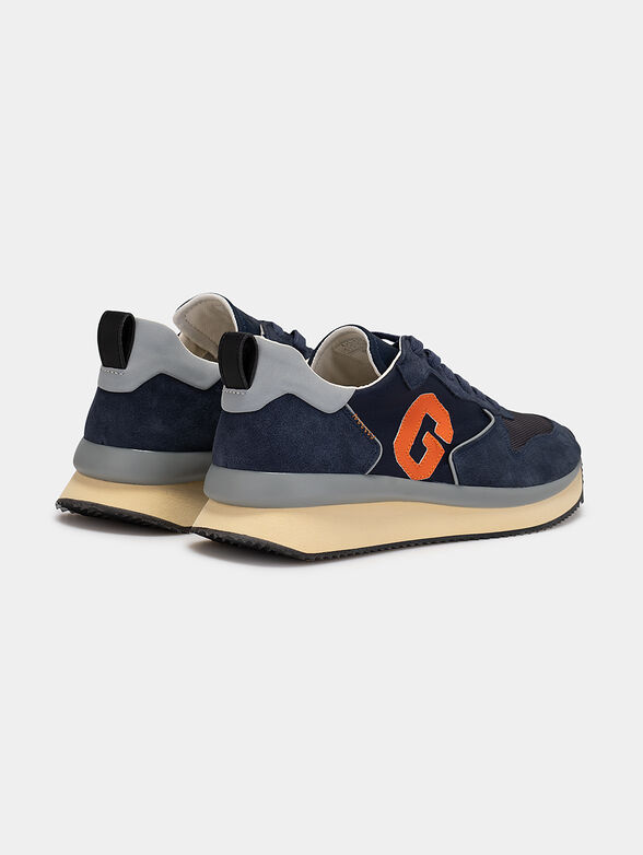Sneakers with logo detail in orange color - 3