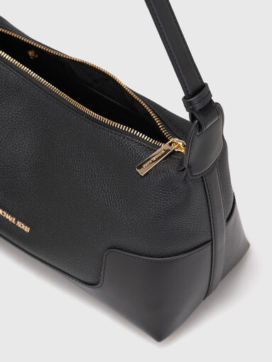 Leather bag with a gold logo - 5