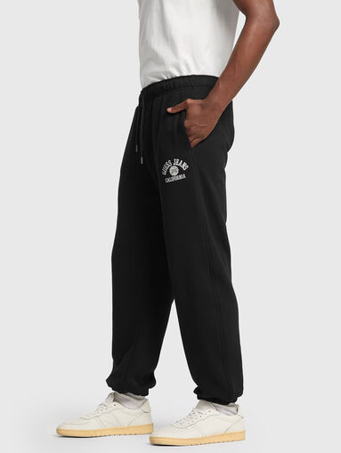 Black sports trousers  with ties at the waist - 3