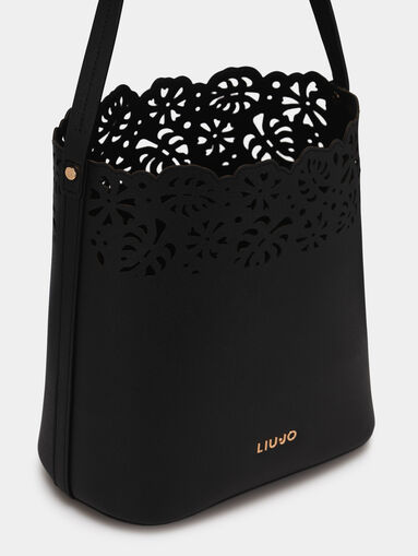 Black bag with laser perforations and case - 4
