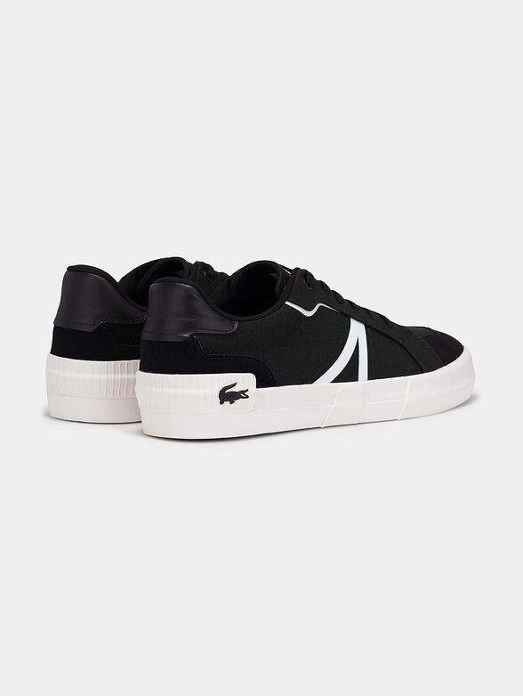 Black sneakers with laces and white accents - 3