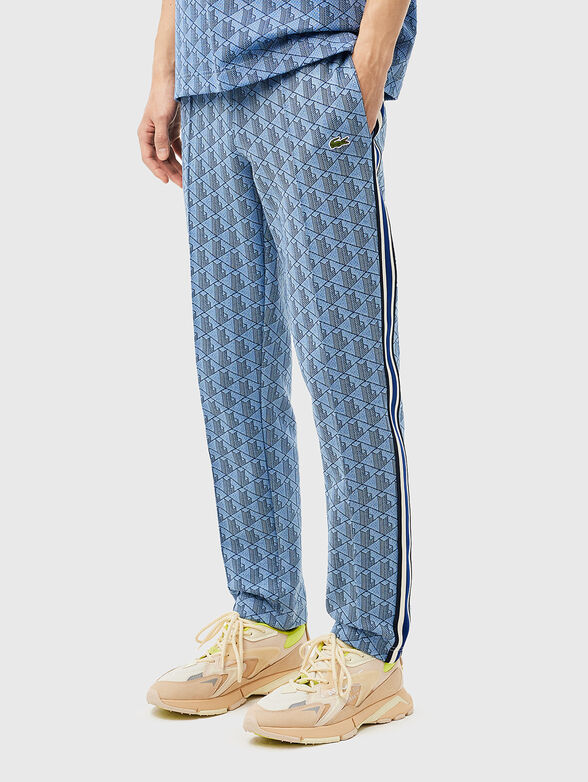 Sports trousers with monogram print - 1