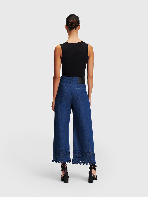 Jeans with perforations and embroidered details - 1