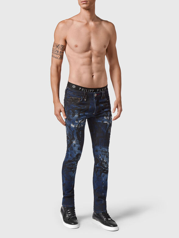 Jeans with washed effect and print - 4