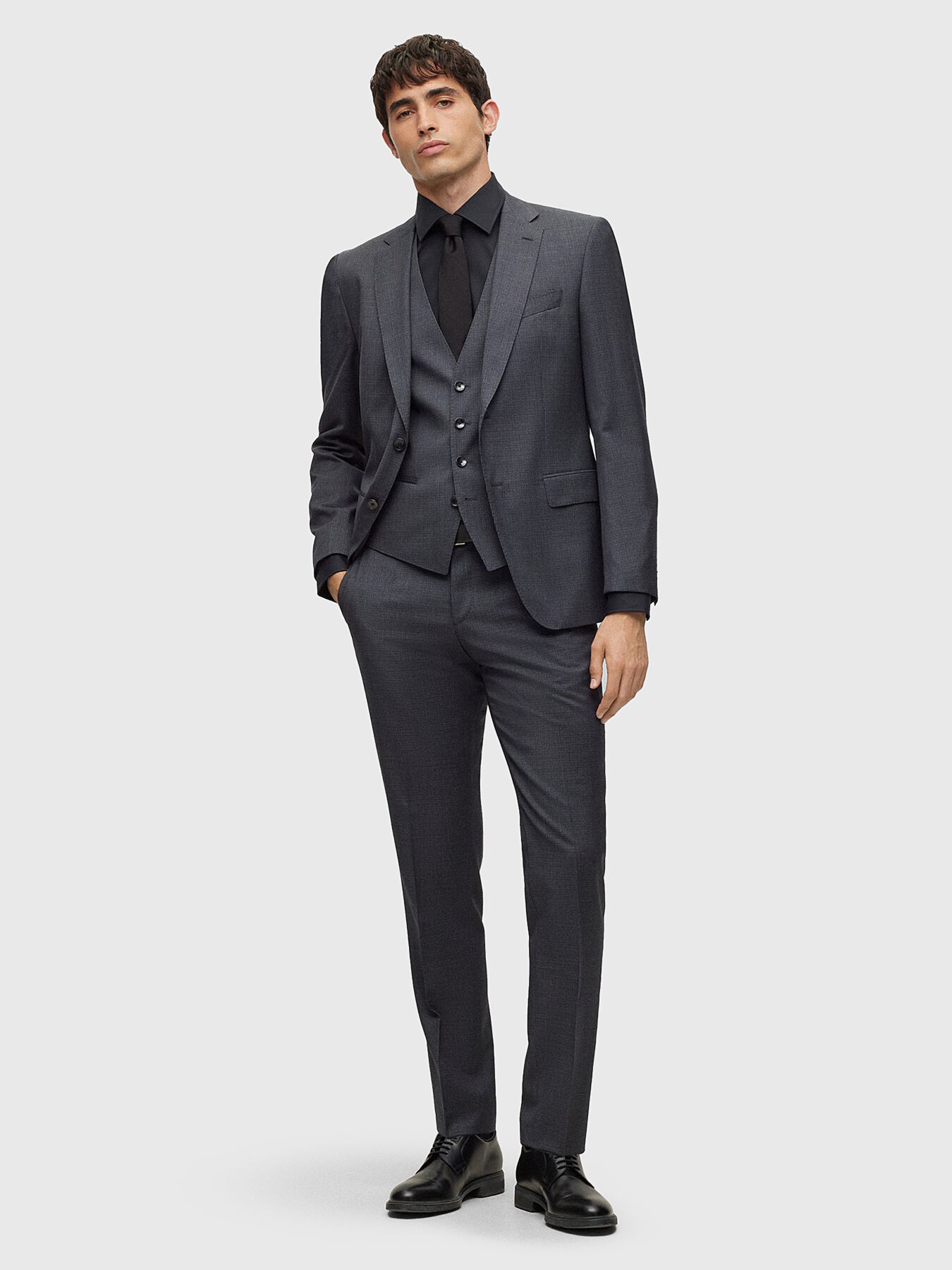 Dark grey three-piece wool suit brand BOSS