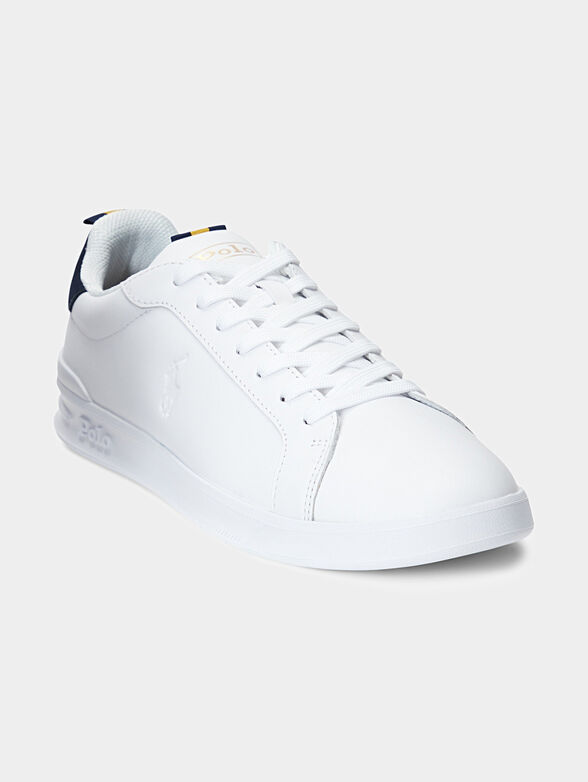 Sports shoes in white color - 2