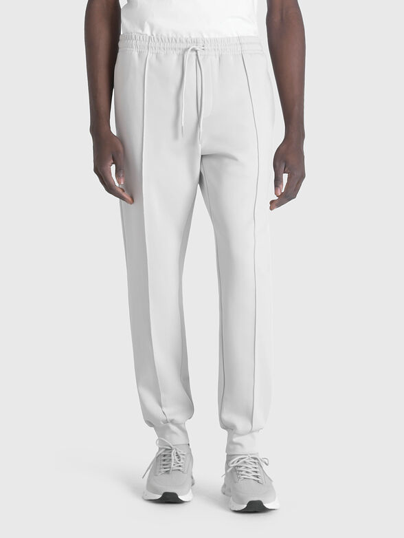 Trousers with elastic waist and pockets - 1