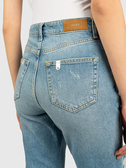 Jeans with abrasions and crystal applications - 4