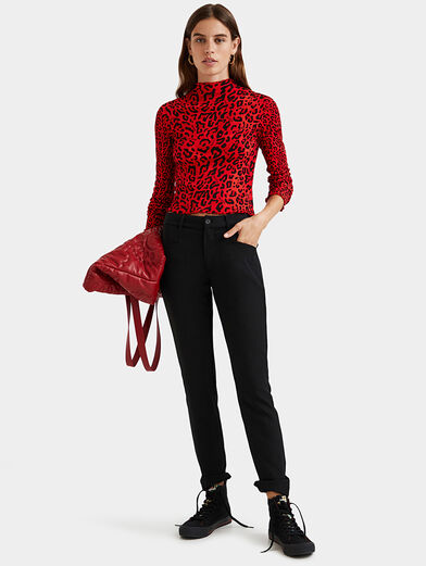 Trousers with embroidered details - 1