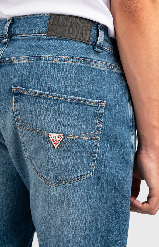 JAMES straight jeans in blue brand GUESS —