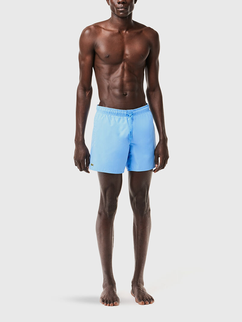 Yellow shorts with logo detail - 3