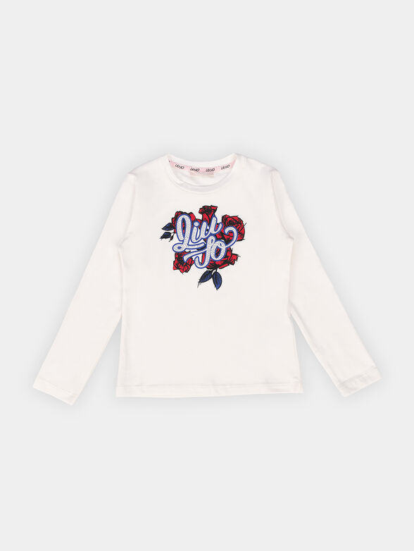 White blouse with shiny appliqu&eacute;s - 1