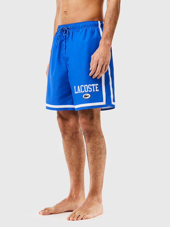Blue beach shorts with contrast logo - 1