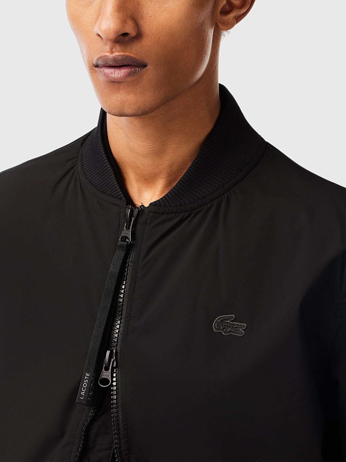 Black bomber jacket brand LACOSTE Globalbrandsstore en
