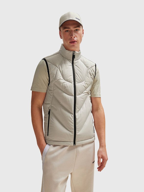 Quilted vest in ecru colour - 1