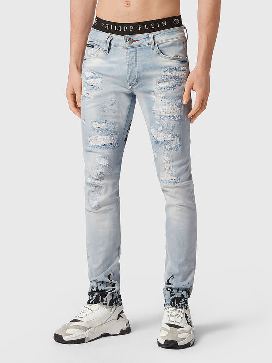 Blue slim jeans with contrasting print - 1