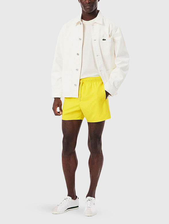 Yellow shorts with logo detail - 4