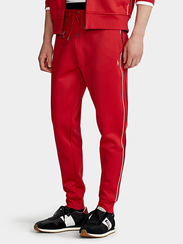 Sports pants in red color - 1