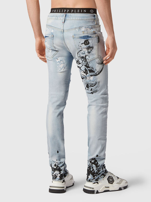 Blue slim jeans with contrasting print - 2