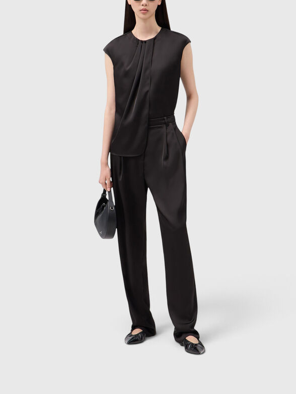Black top with a zip on the back - 2