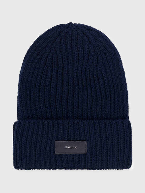 Knitted hat in dark blue color - 1