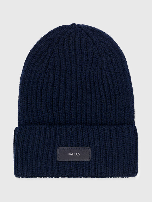 Knitted hat in dark blue color - 1