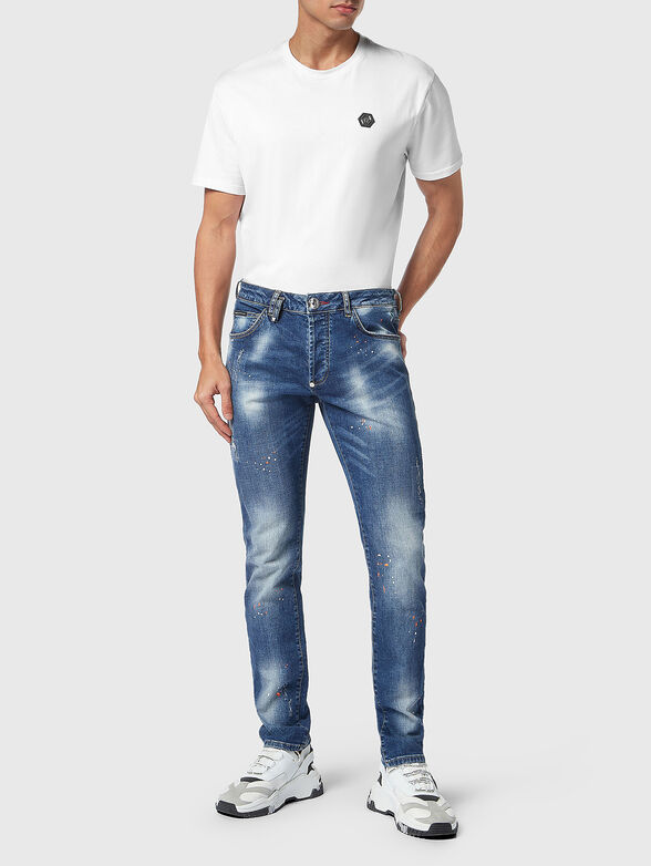 Blue jeans with washed effect and accent rips - 4