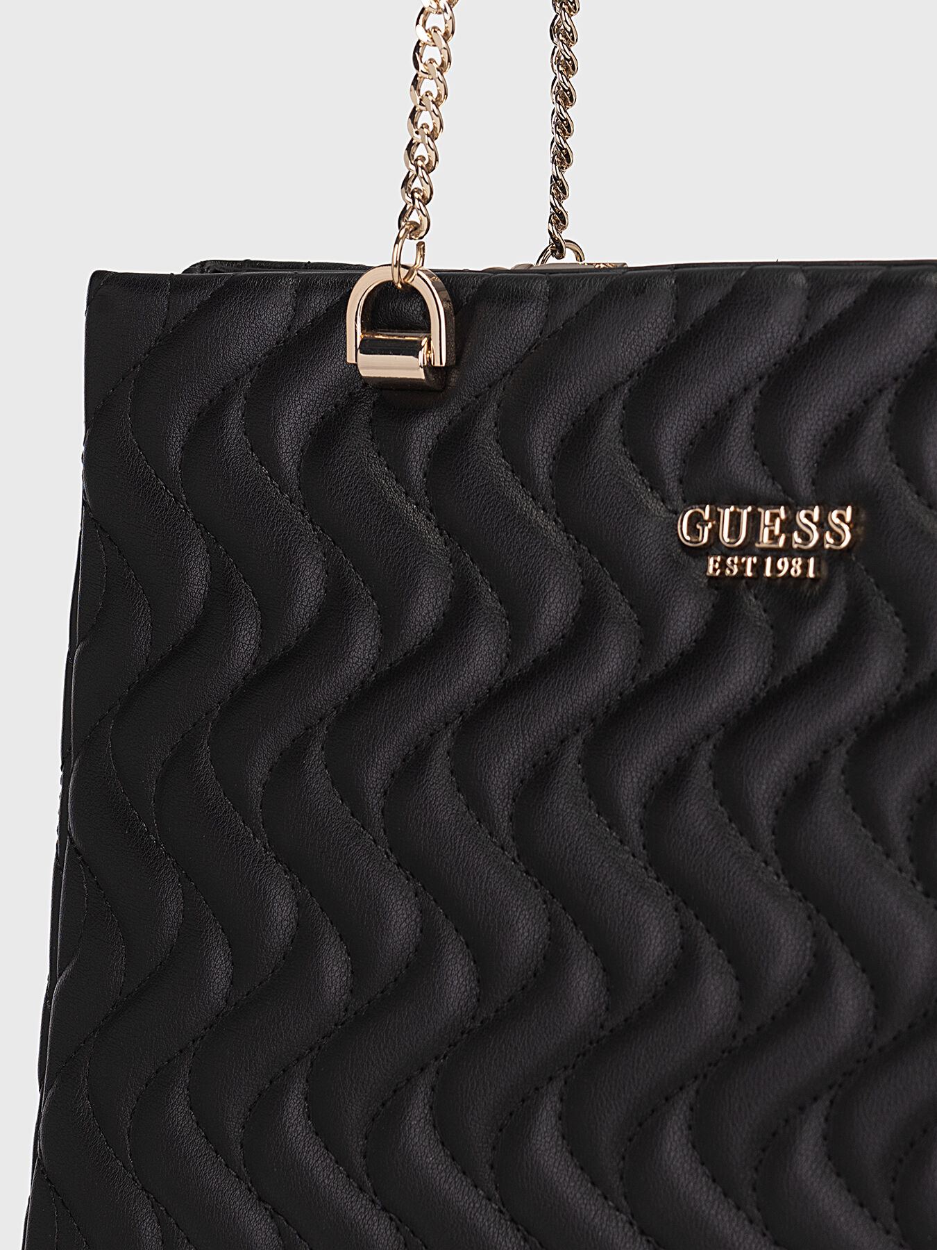 Black quilted bag brand GUESS Globalbrandsstore en