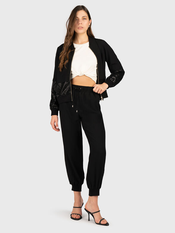 Sports trousers with sequins and logo - 6
